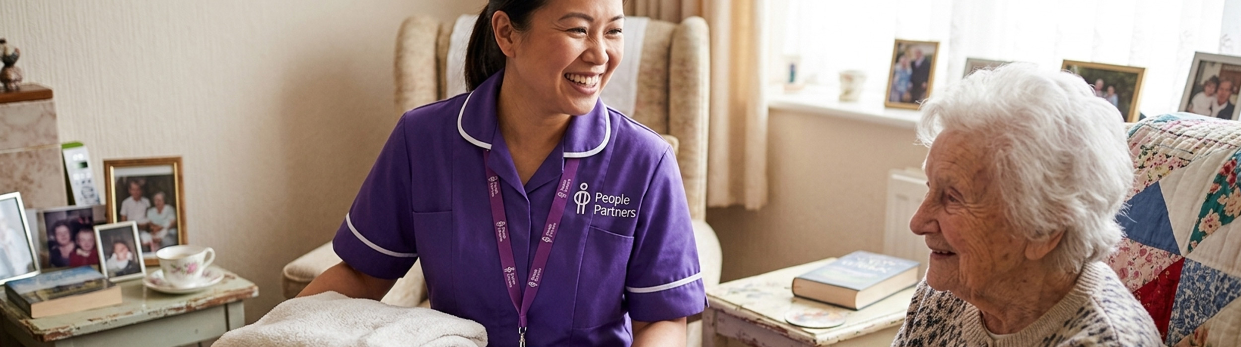 Homecare female carer at home with patient